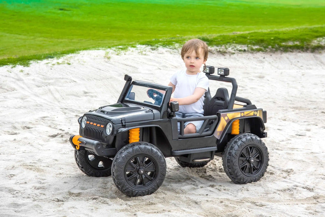 Kids Cars Jeep Kids sitting on Ride on Cars Left View on Sand