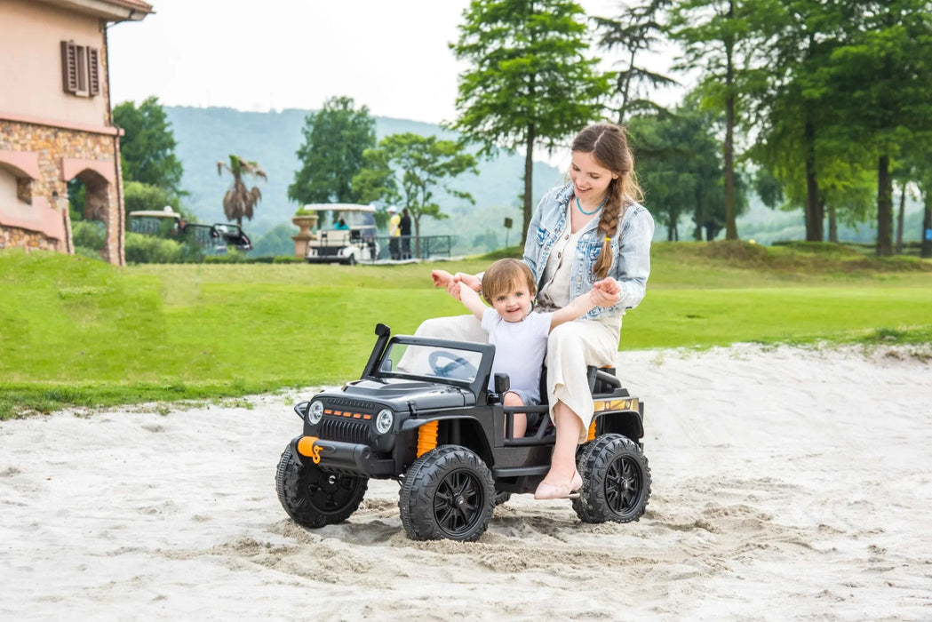 Kids Cars Jeep Kids sitting with mom on Ride on Cars Left View on sand
