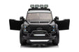 Black toy truck with open doors 