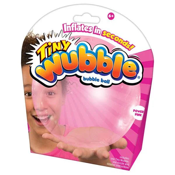 Packaging of a Tiny Wubble bubble ball with a child's face in the background