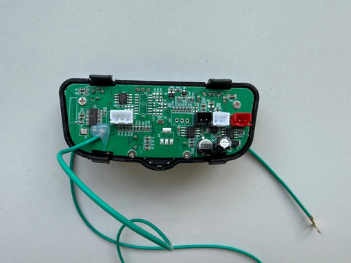 Electronic circuit board with green wires 