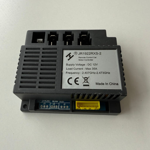 Black electronic module with text and symbols 