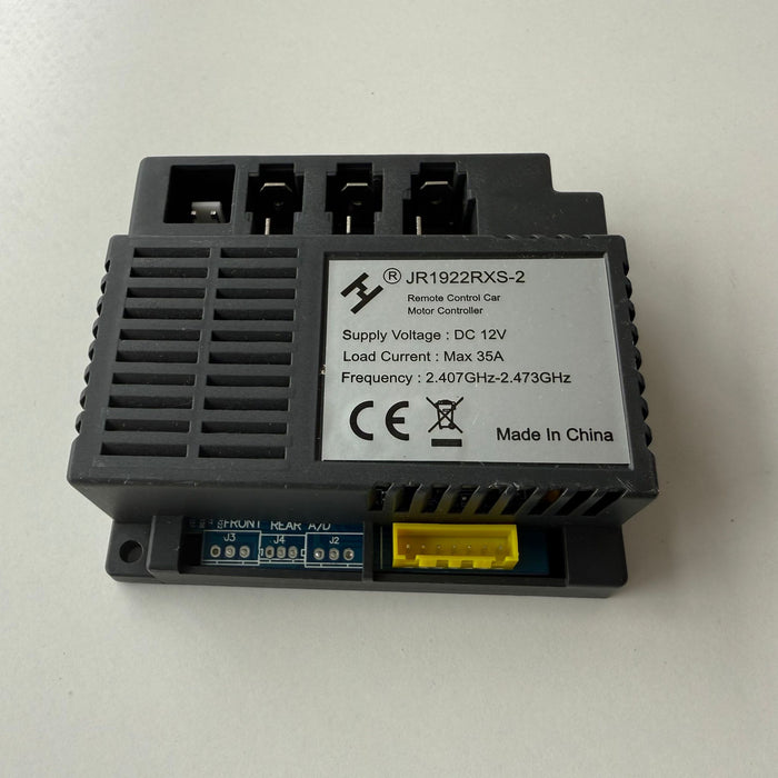 Black electronic module with text and symbols 
