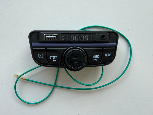 Car audio control unit with USB port and green cable 