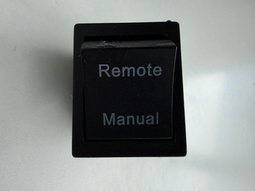 Black switch with 'Remote' and 'Manual' labels