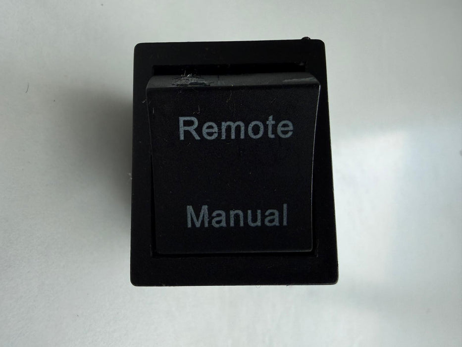 Black switch with 'Remote' and 'Manual' labels