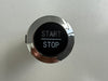 Car start stop button with 'Start' and 'Stop' text 
