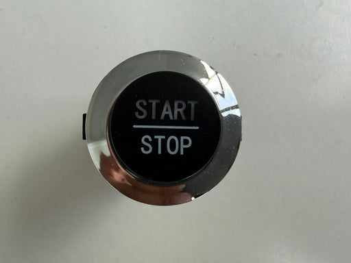 Car start stop button with 'Start' and 'Stop' text 