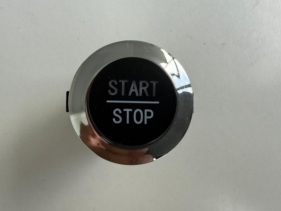 Car start stop button with 'Start' and 'Stop' text 