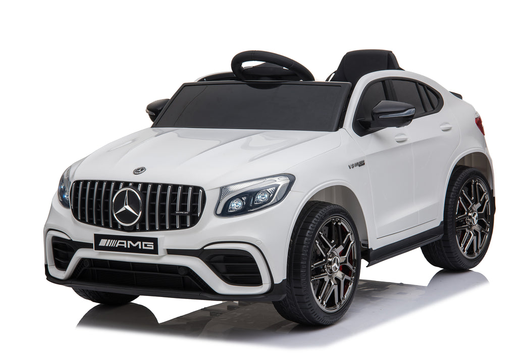 White toy car with Mercedes-Benz