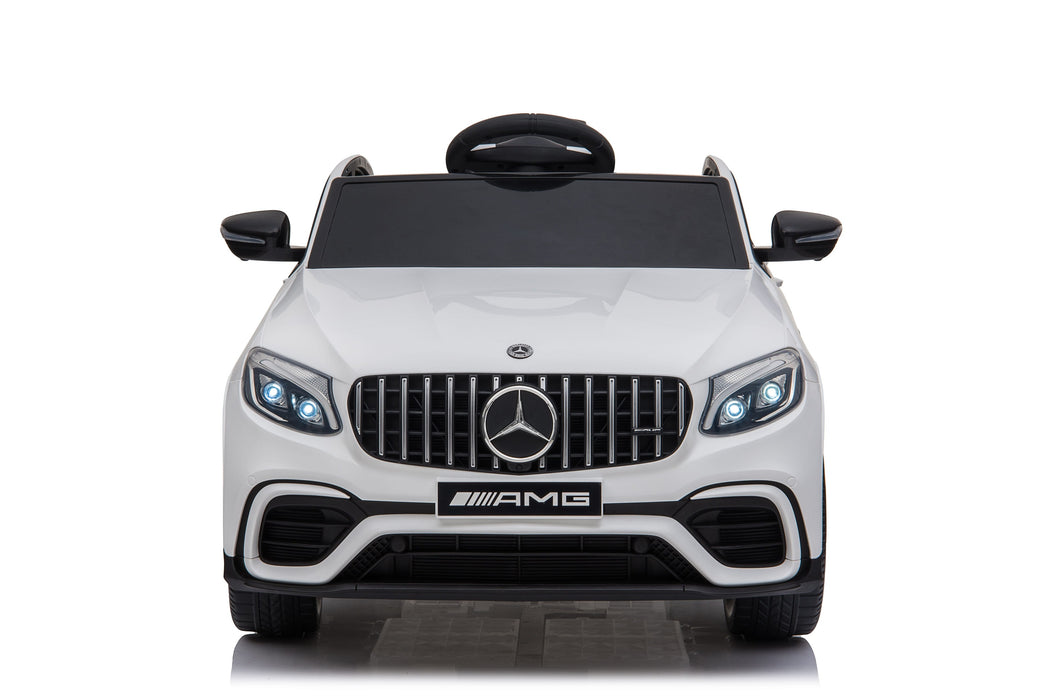 White toy car with Mercedes-Benz logo 