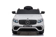 White toy car with Mercedes-Benz logo 